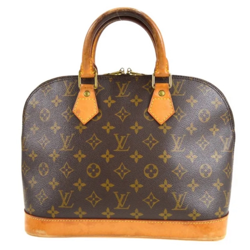 Authentic Louis Vuitton Alma bag purse.